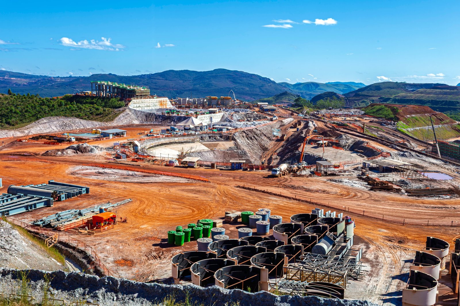 Aerial panoramic view of an open pit mining site construction